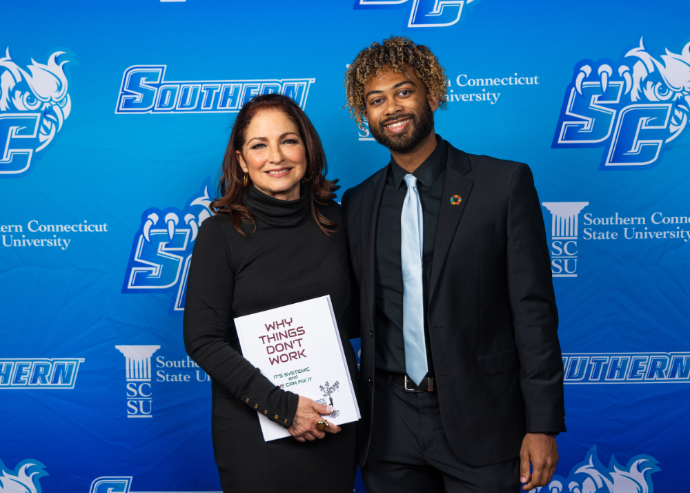 Jonathan De Los Santos SCSU Sophomore Makes Waves at Distinguished Lecture with Gloria Estefan
